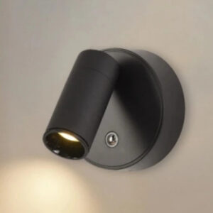Rechargeable wall sconce in black, mounted on a wall